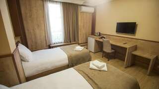 Мини-отель Hotel Juralius Тбилиси Стандартный двухместный номер с 2 отдельными кроватями-17