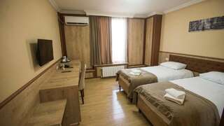 Мини-отель Hotel Juralius Тбилиси Стандартный двухместный номер с 2 отдельными кроватями-19